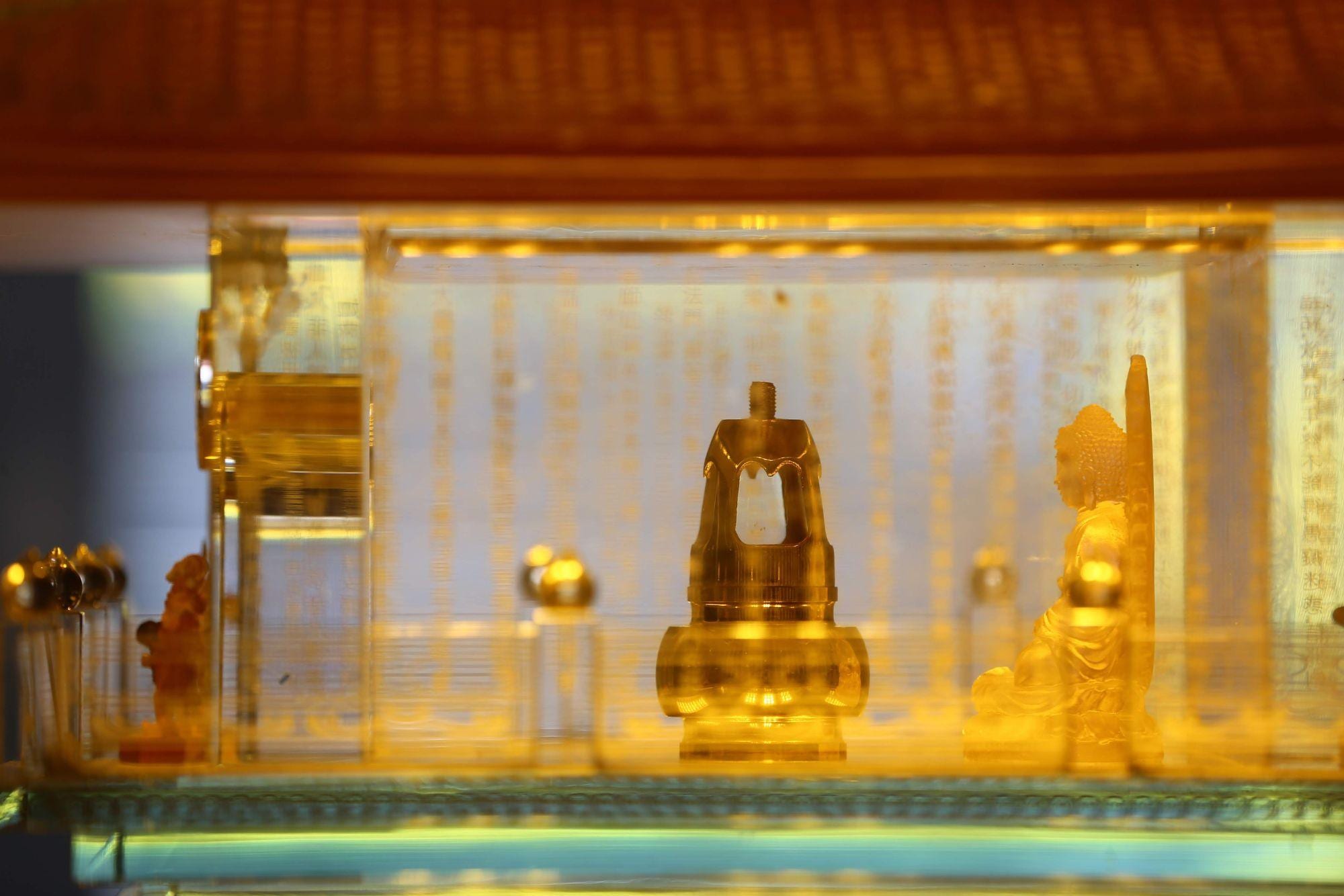 Visitors can admire the Sacred Buddha Relics at the seven-story glass pagoda 